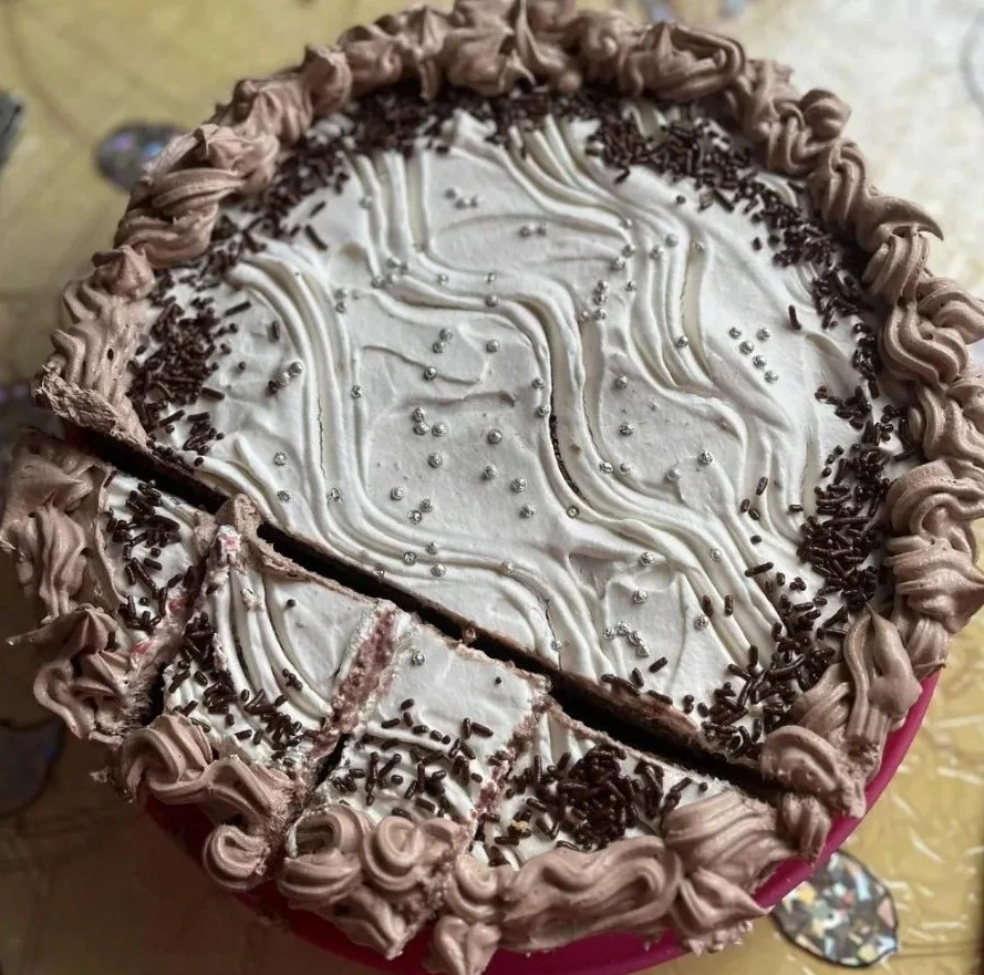 Homemade chocolate birthday cake with colorful frosting